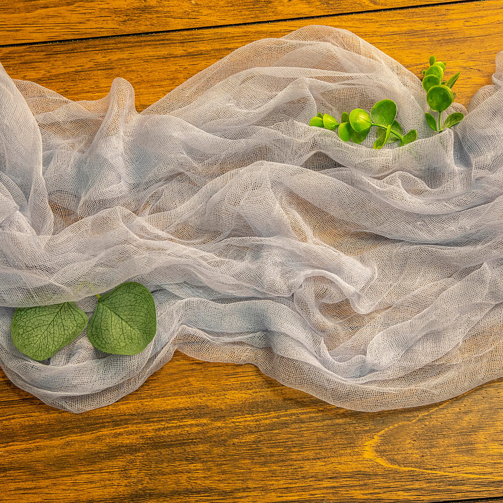 
                  
                    Cheesecloth Table Runner Rental
                  
                